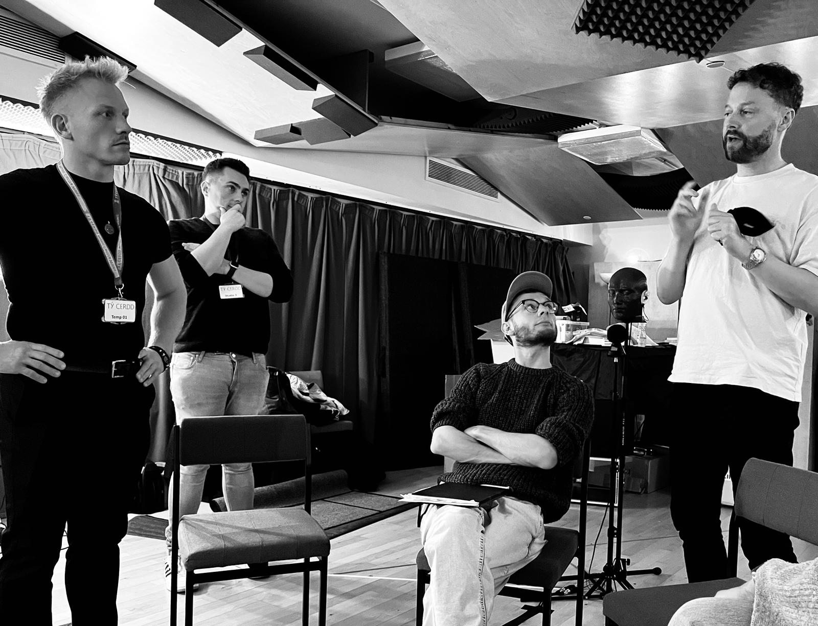 Coven collaborators in discussion in the studio